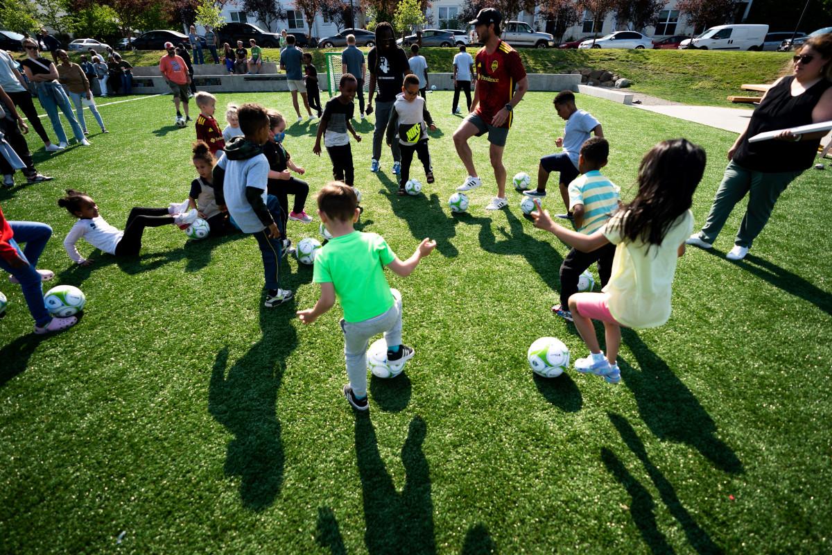 Children with soccer balls